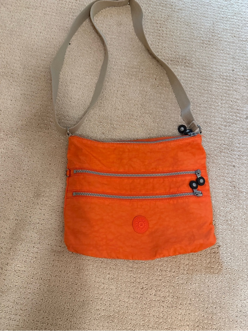 Kipling Orange Crossbody Bag with Beige Adjustable Strap